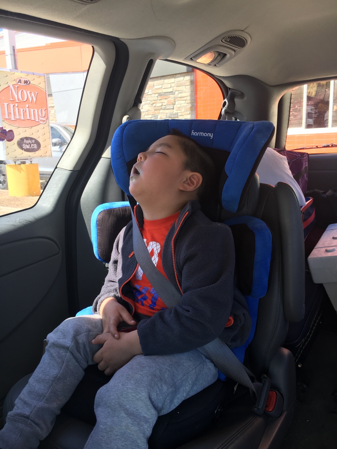 Young Lucas asleep during a short car ride