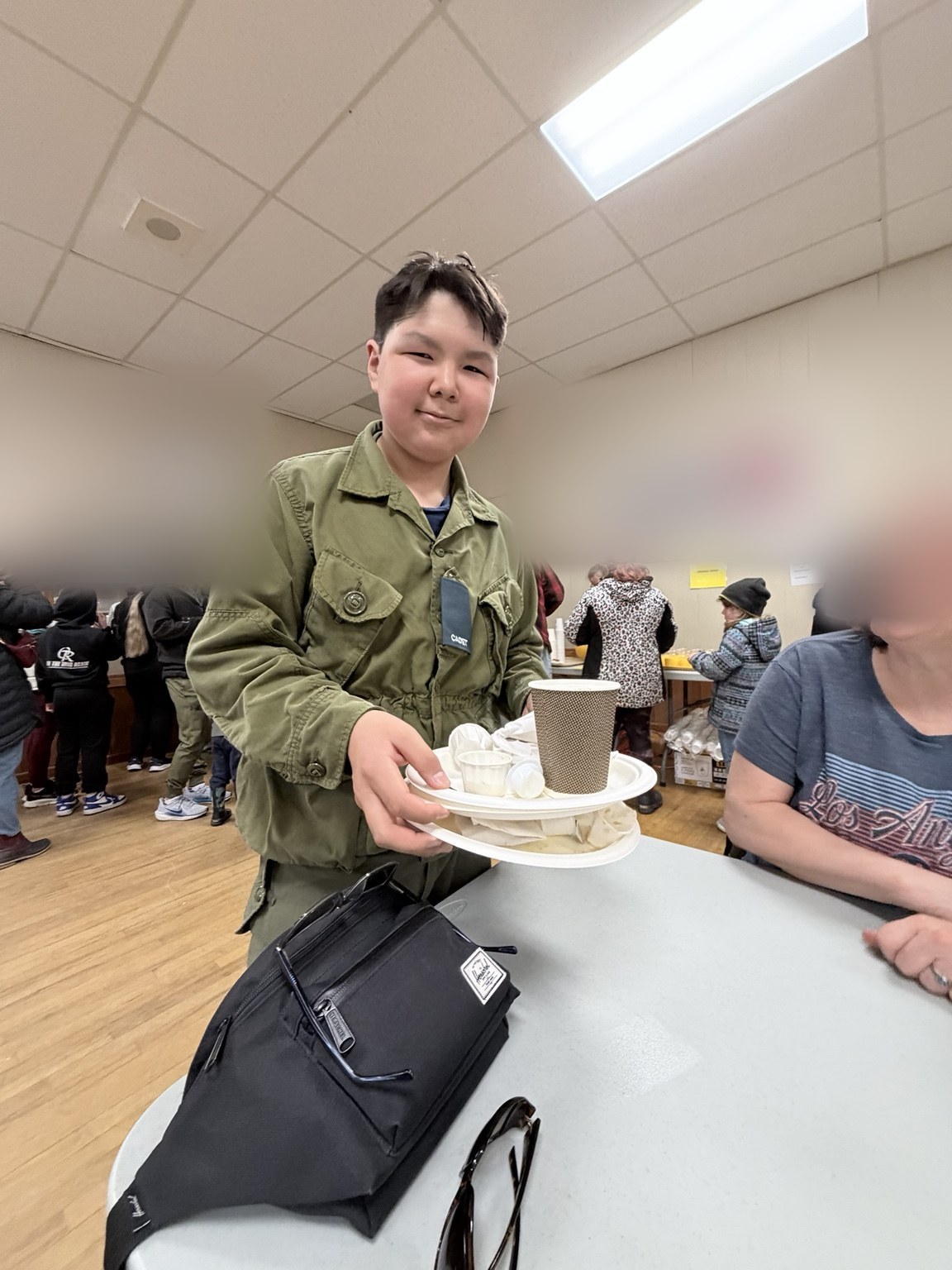Lucas serving at a community event