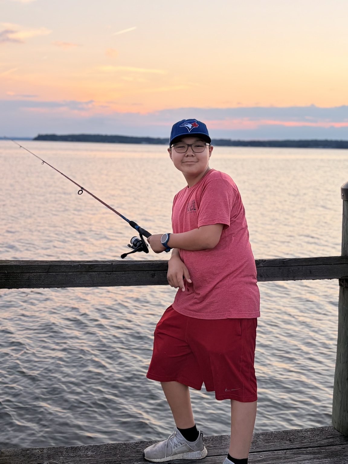 Lucas fishing at sunset